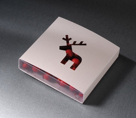 Box with a die-cut reindeer on it