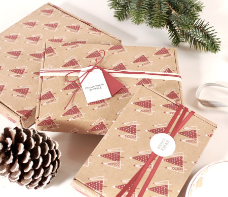 Flat cardboard shipping box with christmas print