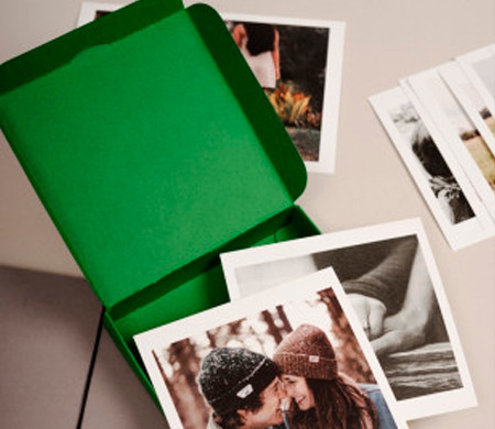 Boîte verte pour Polaroids.