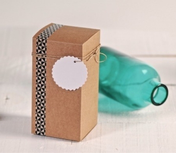 Kraft coloured gift box decorated with washi tape