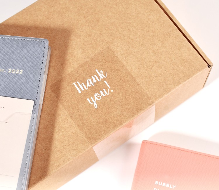 Transparent "Thank you" label for deliveries.