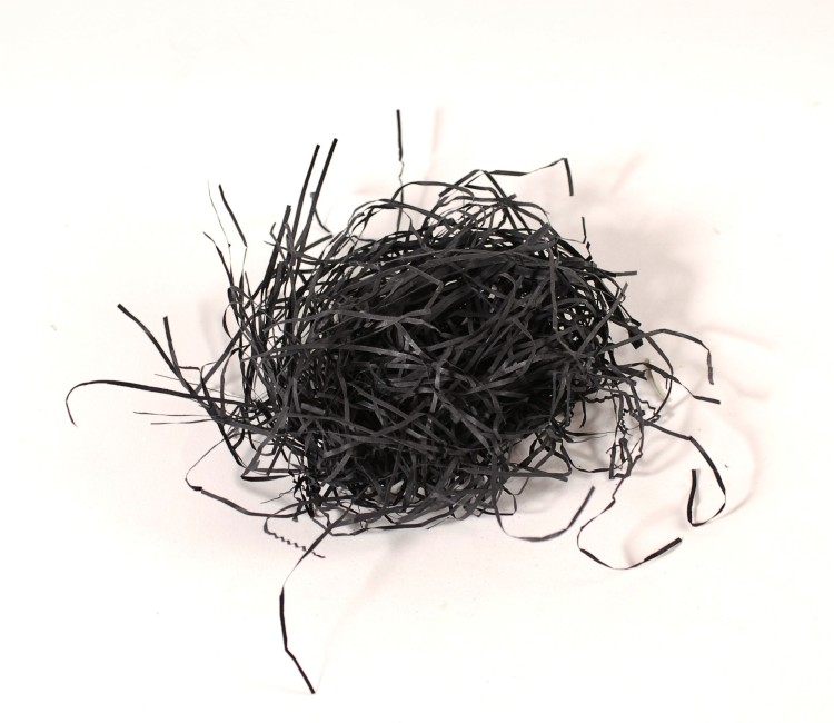Papierschnipsel als Füllung von Kartons Papierschnipsel als Füllung von Kartons