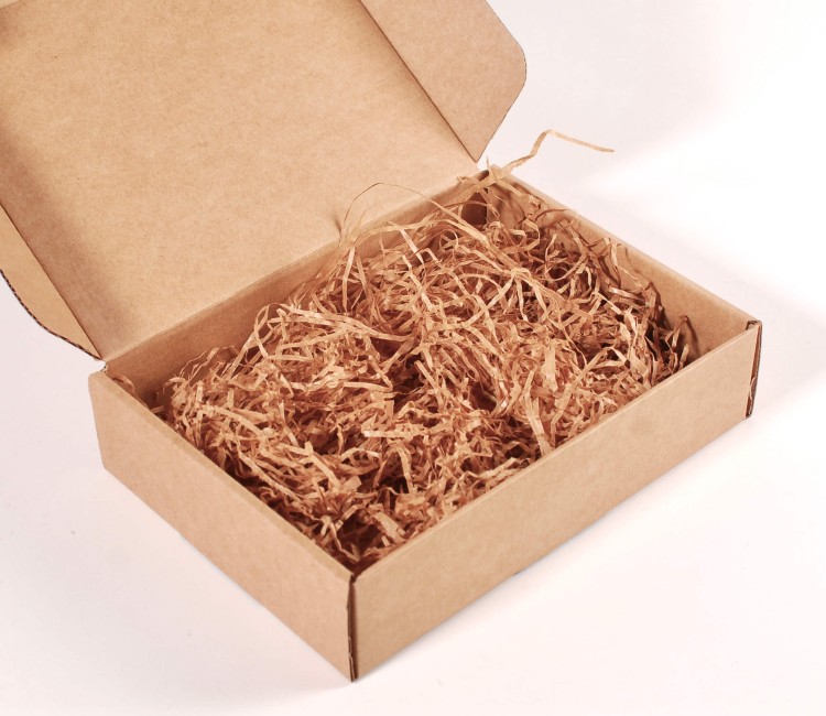 Paper shavings for cardboard boxes