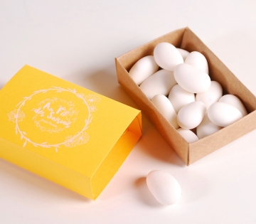 Yellow matchbox-sized gift box